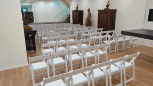 white fold away chairs